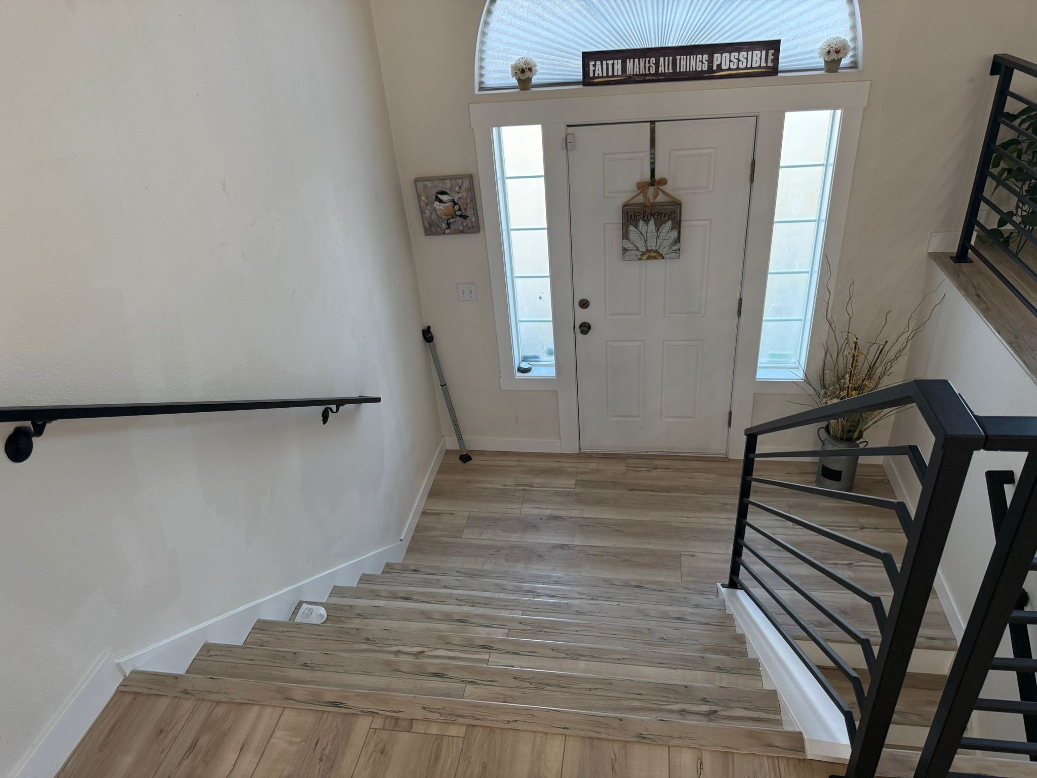 Continuous hardwood flooring in open living space remodel in Seattle area